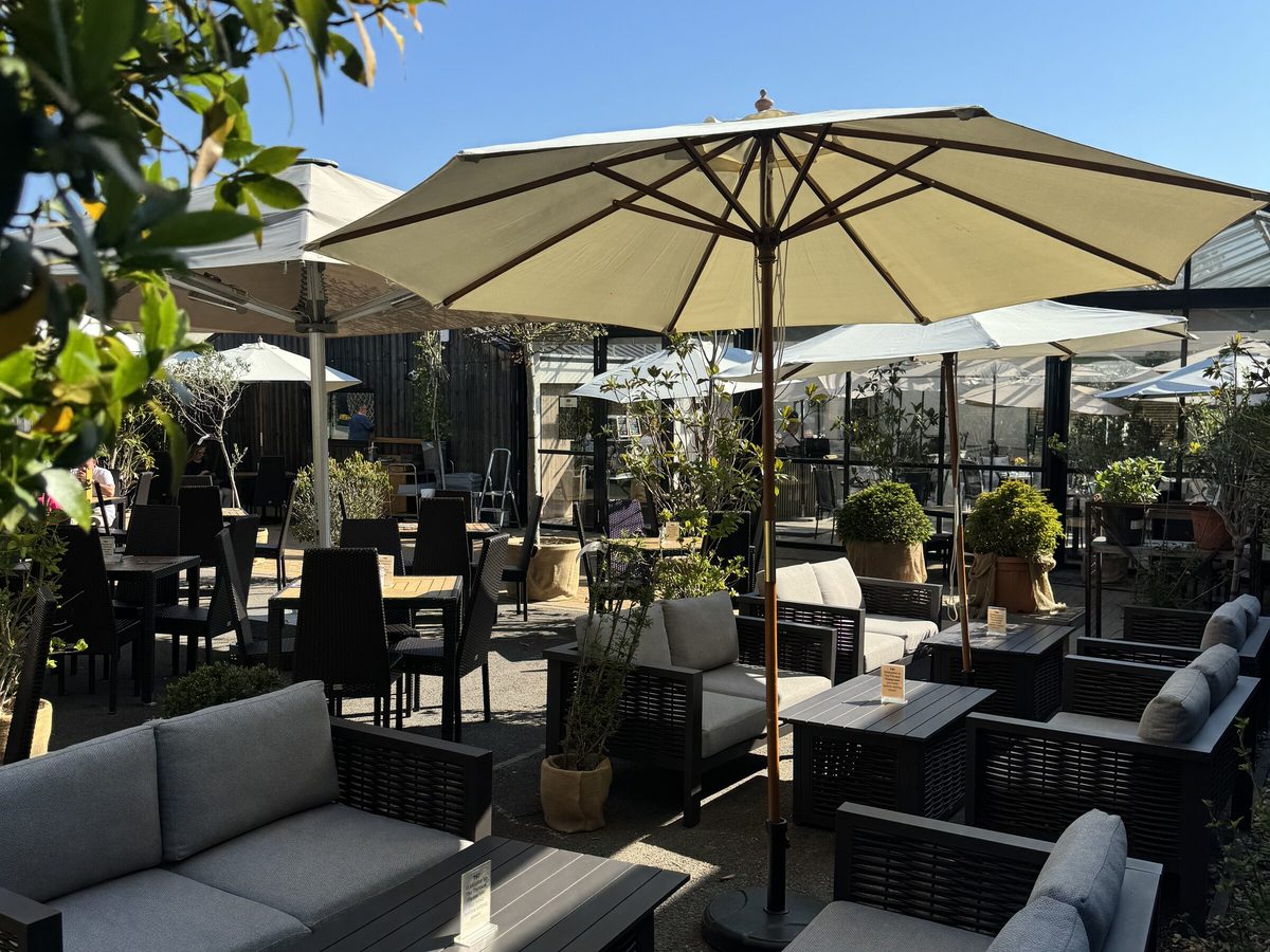 The Courtyard garden terrace at The Glasshouse, Lavershot Barns, Windlesham